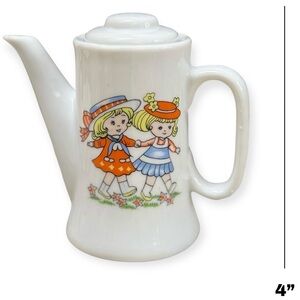 Vintage Ceramic Teapot with Doll Design